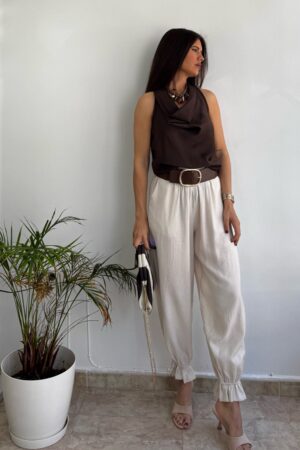 Pantalón puños elásticos  vuelo beige