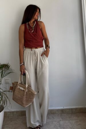 Pantalón tipo lino beige bolsillos